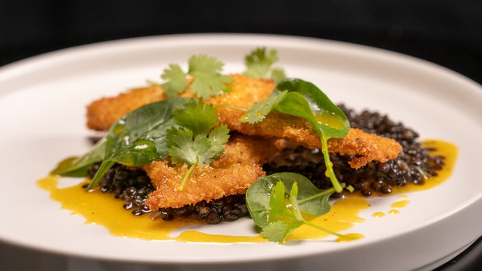 Kokoshähnchen mit Belugalinsen & Orangenvinaigrette