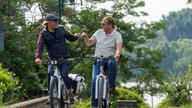 Frank Buchholz und Björn Freitag fahren auf dem Rad.