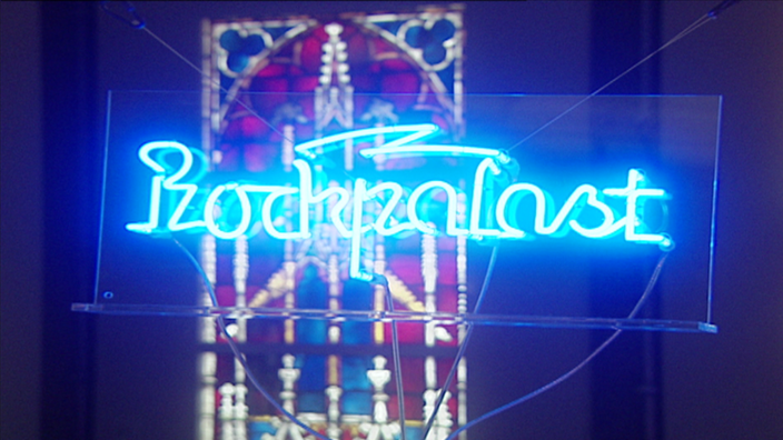 Rockpalast-Schriftzug mit dem Thema Religion in einem Spot aus dem Archiv