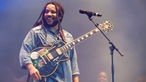 Stephen Marley lacht nach einem stück