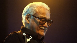 Das Beitragsbild des WDR3 Kulturfeature "Atem der Melancholie" zeigt Toots Thielemans beim Jazz Festival Den Haag 2004