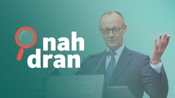 Das Bild zeigt Friedrich Merz mit leicht gehobenen Händen