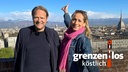 Björn Freitag und Tamina Kallert stehen vor der Kulisse von Turin. 