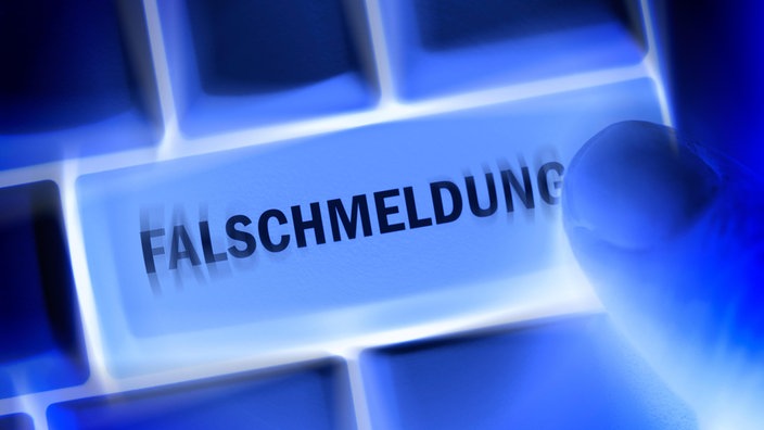 Falschmeldung-Schriftzug auf einer Computertaste