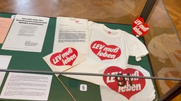 Infostand mit Merch-Artikel des Geschichtsverein