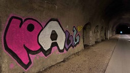 Ein Graffiti im Tunnel