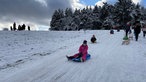 Kinder fahren Schlitten in NRW 