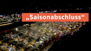 Thumbnail auf dem ein großer Parkplatz mit Autos und die Aufschrift "Saison-Abschluss" zu sehen ist.