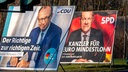 Wahlplakate von Friedrich Merz und Olaf Scholz