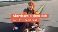 Aktivisten kleben sich auf Rollfeld fest