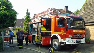 Feuerwehrauto steht auf der Straße in Münster