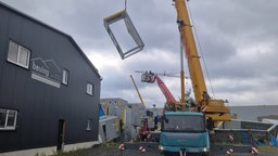 Aufräumarbeiten nach einem schweren Unwetter