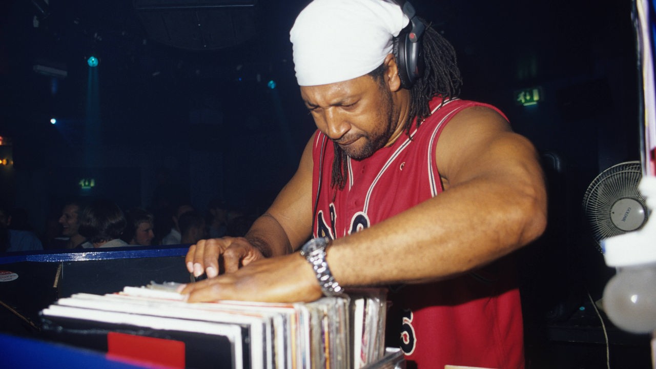 DJ Kool Herc, looking through his records