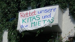 Protesttransparent: Rettet unsere Kitas und die Mietas