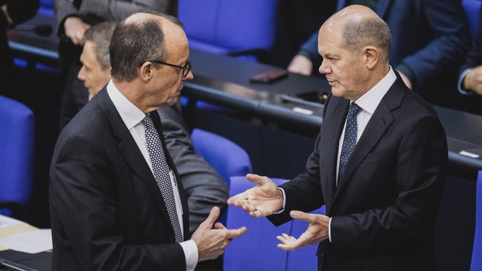 Friedrich Merz i Olaf Scholz u Bundestagu