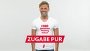 Satirische Fotomontage: Jürgen Klopp trägt lachend ein weißes Shirt mit der Aufschrift: Hier könnte Ihre Werbung stehen!