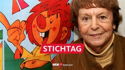 Die Kinderbuchautorin und Erfinderin der Zeichentrickfigur "Pumuckl", Ellis Kaut, steht neben einem Plakat mit dem Kobold Pumuckl (Archivbild vom 15.10.2005)