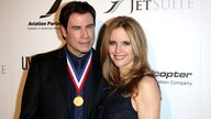 John Travolta und Kelly Preston bei einer Preisverleihung der Luftfahrtindustrie.