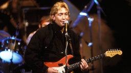 Chris Rea bei einem Auftritt 1984