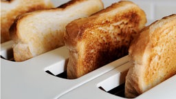 Vier Toastbrote im Toaster