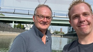 Frank Plasberg und Reporter Daniel Schlipf