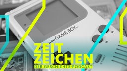  Ein "Game Boy" liegt auf einer Reihe von Spielen