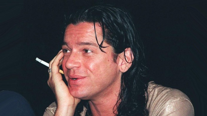 Michael Hutchence bei Pressekonferenz im September 1996