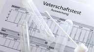 Vaterschafts-Testauswertung mit Teststäbchen