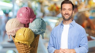 Das Bild zeigt Daniel Aßmann. Neben ihm ist ein Waffeleis mit vier Kugeln zu sehen.