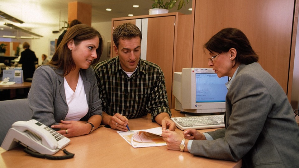 Finanzberater mit Kunden